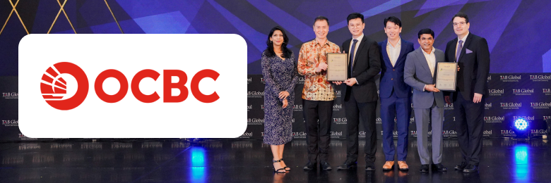 OCBC team winning an award on stage.